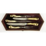 A Victorian double country house carving set,together with a sharpening steel,the steel blades