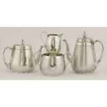 A Victorian silver matched four-piece tea and coffee set,comprising:the coffee pot,by John Samuel