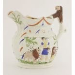 A pottery jug,Staffordshire, c.1840, moulded with a lion tamer with lions, leopards and other