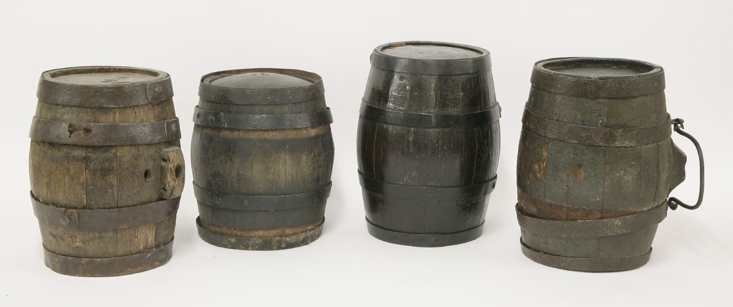 Four treen costrels, 19th century, each of coopered construction, with iron hoops, three with - Image 2 of 4