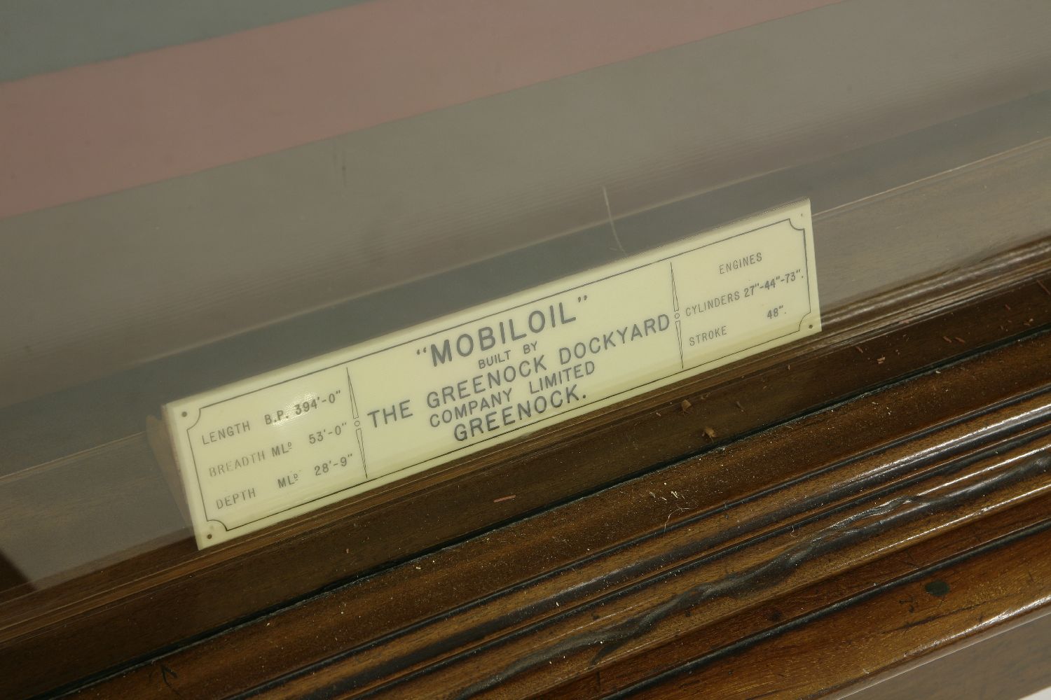 A mahogany cased half ship model 'Mobiloil',with a mirror back, cracked, labelled 'Mobiloil', with - Image 10 of 17