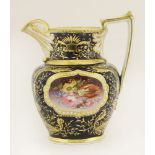 A Coalport hand-painted jug, c.1810, with panels of flowers within a shaped gilt cartouche against a