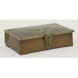 A French Art Nouveau rosewood casket,early 20th century, the cover with ornate brass inlay and
