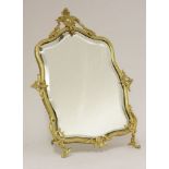 A gilt bronze table mirror,with an easel back and gilt mounts,28.5cm wide37cm high