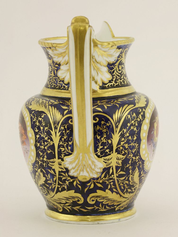 A Coalport hand-painted jug, c.1810, with panels of flowers within a shaped gilt cartouche against a - Image 3 of 3