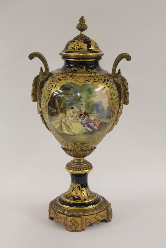 A large French porcelain vase and cover,c.1880, of inverted baluster form painted with an 18th