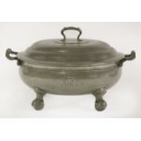 An oval pewter tureen and cover,made as part of the service for the Coronation Banquet at