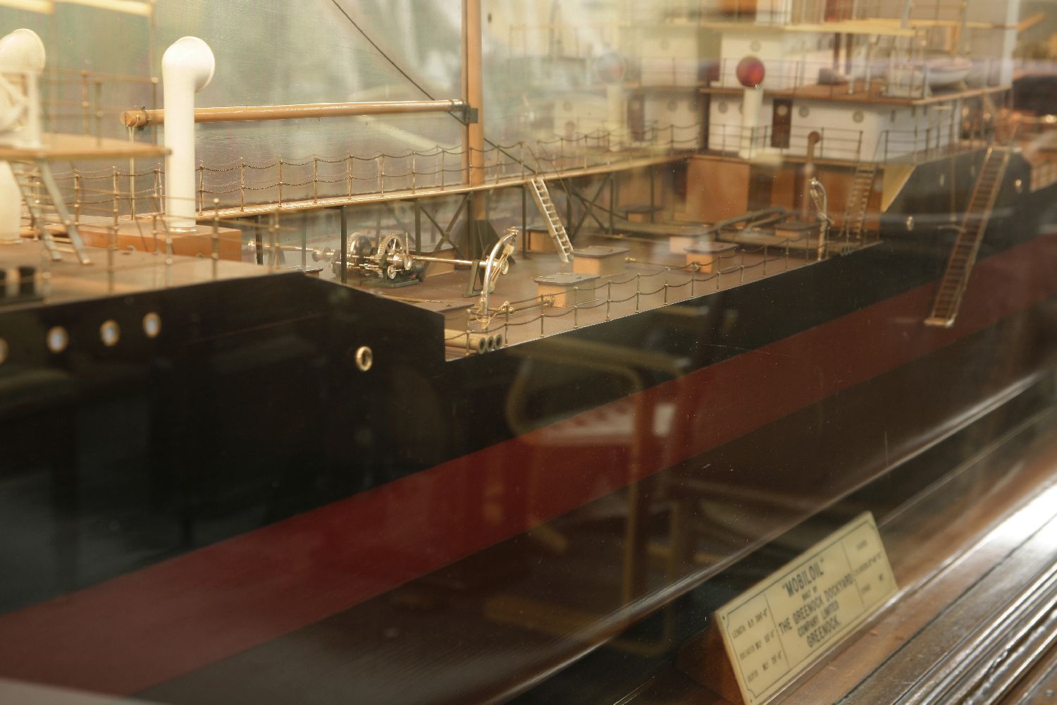 A mahogany cased half ship model 'Mobiloil',with a mirror back, cracked, labelled 'Mobiloil', with - Image 7 of 17