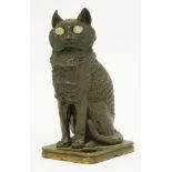 A bronze inkwell,late 19th century, modelled as a seated cat with hinged head and glass eyes,23cm