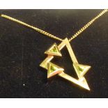 A ladies 9 carat yellow gold geometric Pendant set with three smaller geometric olivine's,