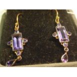 A pair of ladies gold amethyst and diamond set drop Earrings of fine quality