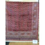 A red ground Bokhara Carpet, 2.30 x 1.