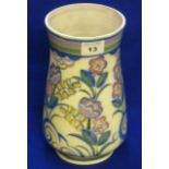 A large Poole Pottery Vase in typical floral pattern marked Carter Stabler and Adams, Poole,