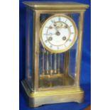 A fine 19th Century "four glass" Mantel Clock, white enamel dial with Roman numerals,