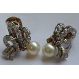 A pair of ladies clip on yellow and white metal Earrings,