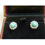 A pair of ladies white metal Stud Earrings,