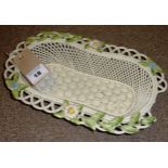 ITEM DAMAGED    A very finely modelled mid 20th Century Belleek porcelain lattice work and basket