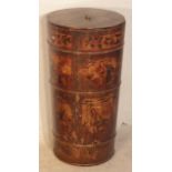 A large late 19th Century Chinese softwood coopered Barrel of tapering cylindrical form,