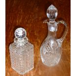 A cut glass Claret Jug and Stopper together with a heavy Whisky Decanter and Stopper (2)