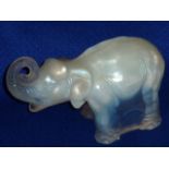 An unusual Art Deco period opalescent glass Model of an elephant,