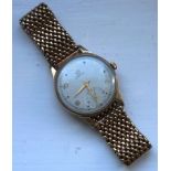 A mid 20th Century Gentleman's 9ct yellow gold cased wristwatch,