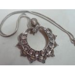 A large Pendant set with early rose cut diamonds