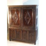 An early 18th Century patinated oak Aumbry,