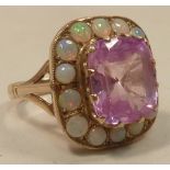 A 9 carat gold Ring set with a large kunzite and opal cluster