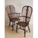 A matched pair of 19th Century comb backed Windsor Armchairs,