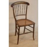An unusual Regency period painted Bedroom Chair with rattan cane seat,