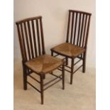 A pair of late 19th/early 20th Century stained wood Arts and Crafts Bedroom Chairs in Liberty's