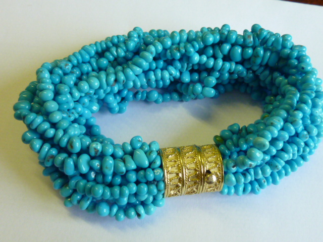 An unusual multi-band turquoise beaded Bracelet,