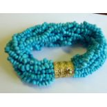 An unusual multi-band turquoise beaded Bracelet,