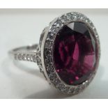 A large 18 carat white gold rubylite and diamond Cluster Ring