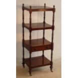 A 19th Century four tier mahogany Whatnot, the third tier with full width drawer,