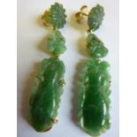 A pair of carved jade and 18 carat yellow gold drop Earrings,