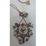 A Victorian style opal and diamond Pendant on a 9 carat Chain