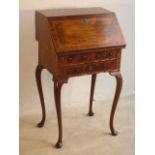 A George I style walnut Writing Bureau,