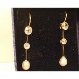 A pair of good quality diamond and pearl Earrings,