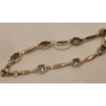 A 9 carat gold Bracelet with aquamarine links