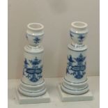 A pair of early 20th Century Meissen porcelain Candlesticks hand painted in underglaze blue with