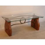 A fine contemporary glass topped and wrought iron Occasional/Coffee Table having shaped burr-elm