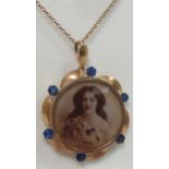 A Victorian style gold Locket set with sapphires,