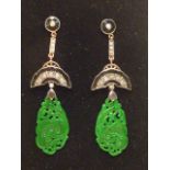 A pair of carved jade,