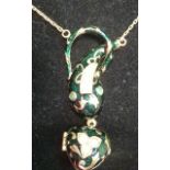 A 9 carat gold green enamel and pearl set Pendant and Chain