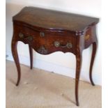 A Dutch late 18th Century style serpentine fronted mahogany,