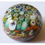 A circular glass Paperweight with Millefiori style canes, 6.