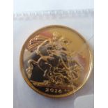 A Queen Elizabeth II gold Sovereign dated 2014