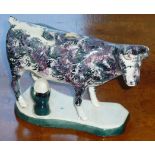 A mid 19th Century Staffordshire Potteries spongeware style pottery Cow Creamer (minus cover),