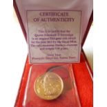 A boxed 2013 UK gold Sovereign